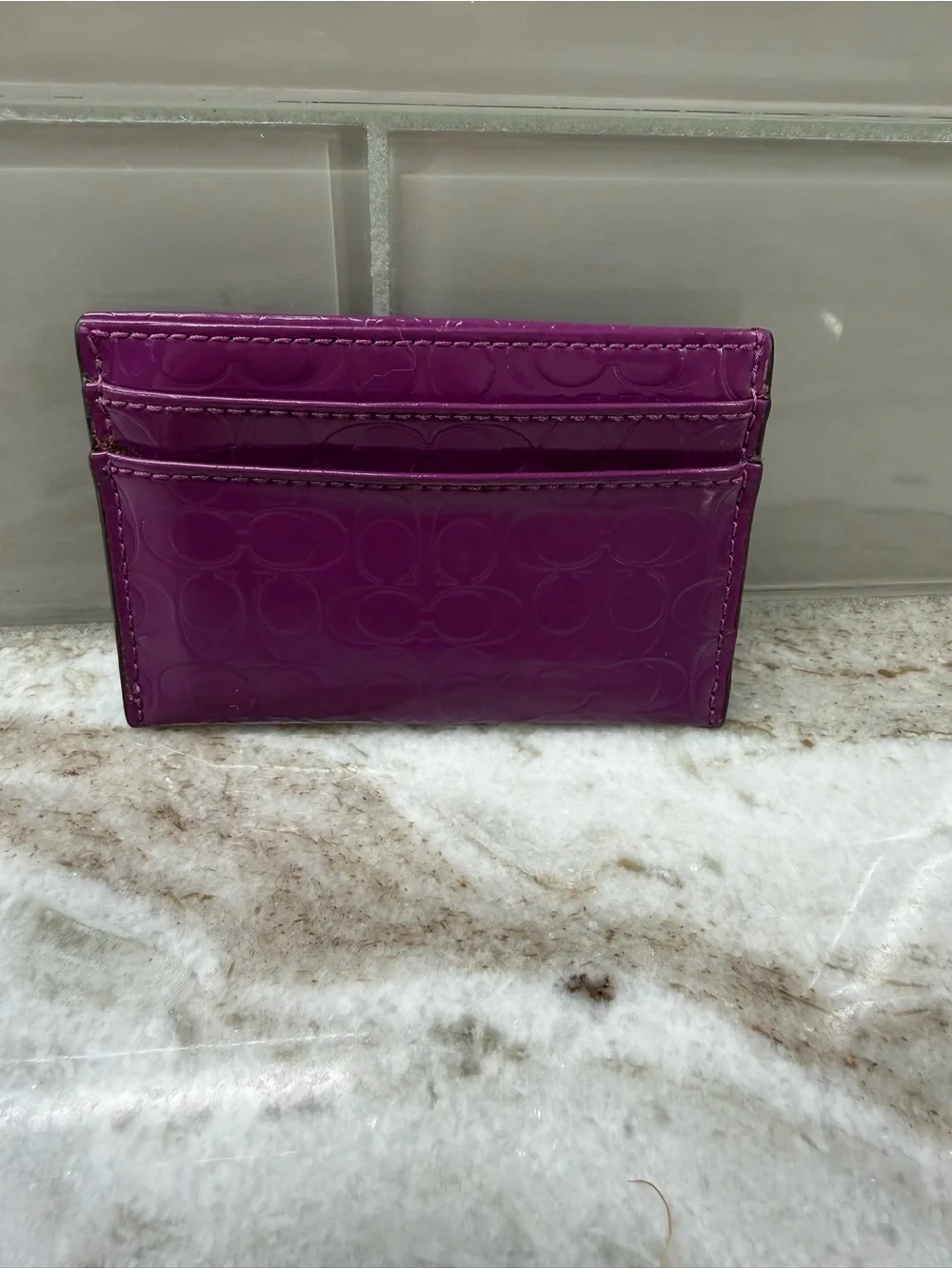 Embossed Coach Card Case in Deep Purple